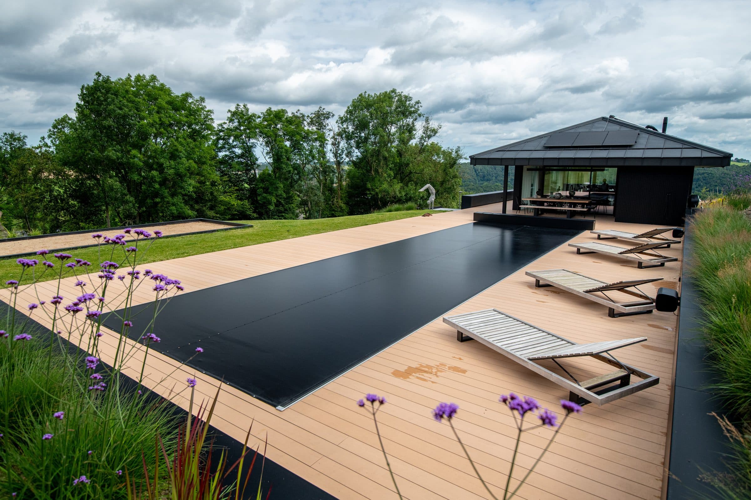 Black cover against a timber deck