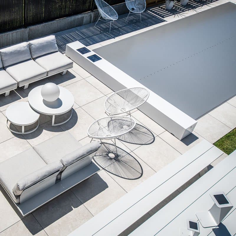 Grey cover beside a white lounge terrace
