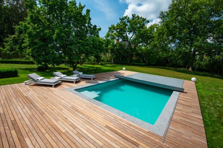 Grey housing parked on a timber deck