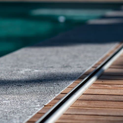 The low profile track between stone and timber